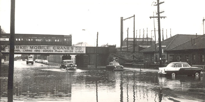Historical photo showing Montague Street in South Melbourne during a flood