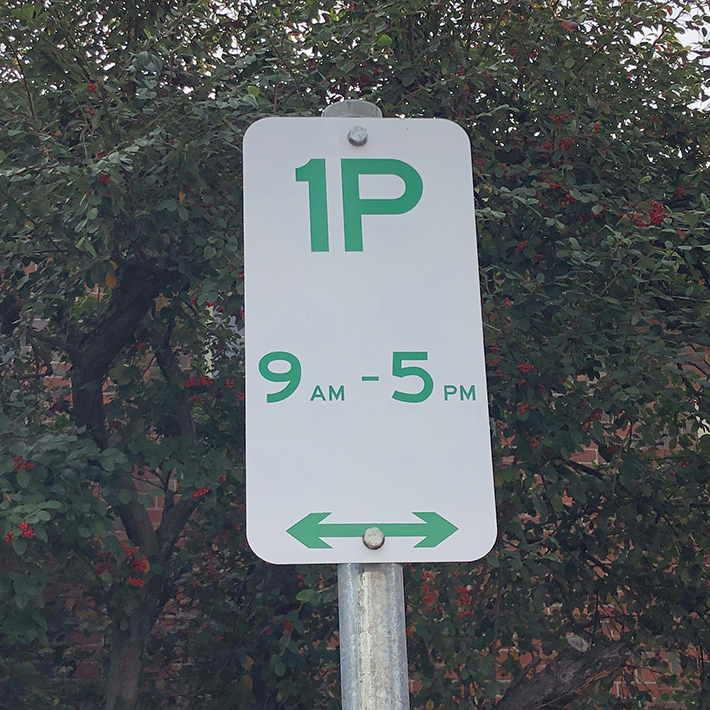 Parking sign for restricted time parking.